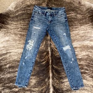 Buckle Black acid wash skinny jeans
